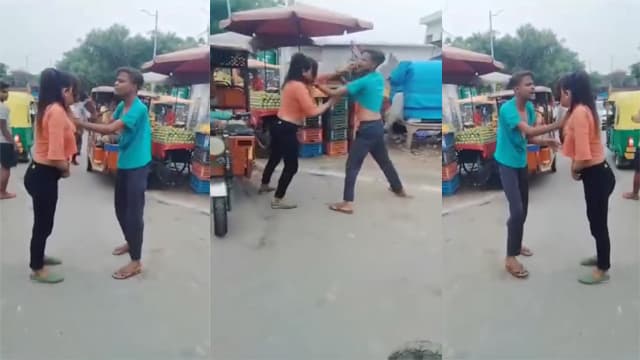 Girl stripped naked in a fight between boy and girl on the street